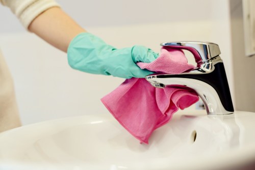 Steam cleaning carpet fibers with deep extraction equipment